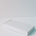 Коробка с откидной крышкой 32x14x4 см белая