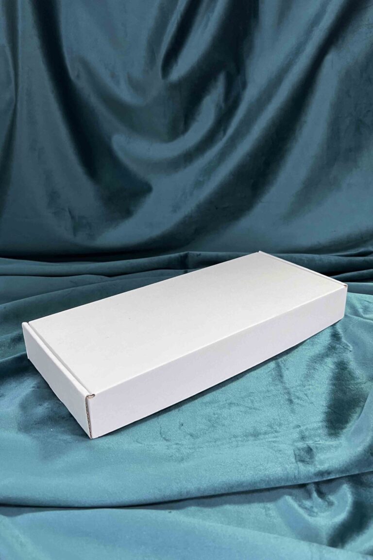Коробка с откидной крышкой 32x14x4 см белая